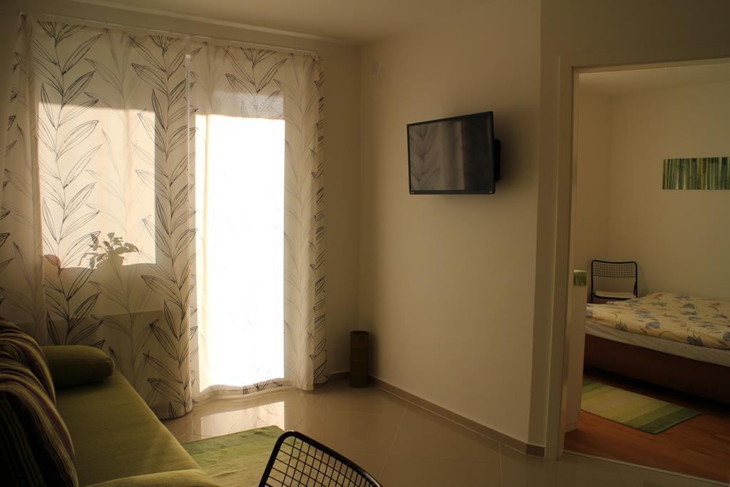 Bamboo Wellness Apartment Siófok Pokoj fotografie