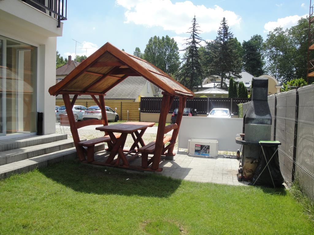 Bamboo Wellness Apartment Siófok Pokoj fotografie